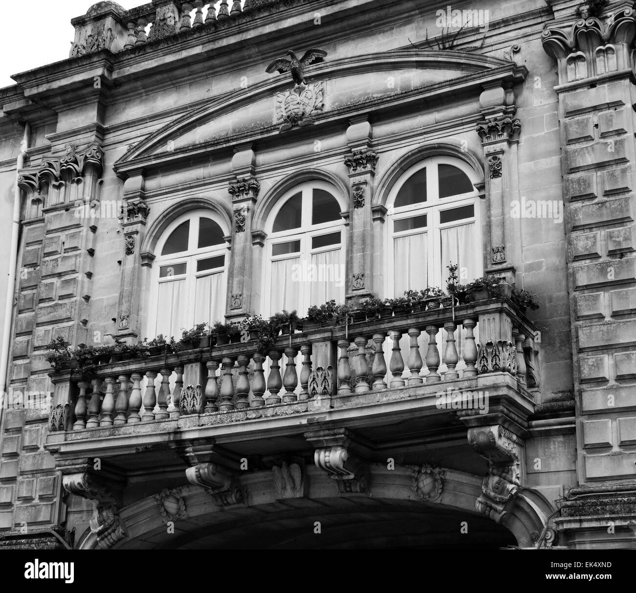 Italy, Sicily, Ragusa Ibla, original balcony in a baroque palace Stock Photo