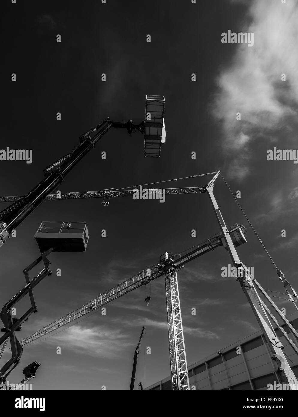 Blue sky and cranes Black and White Stock Photos & Images - Alamy