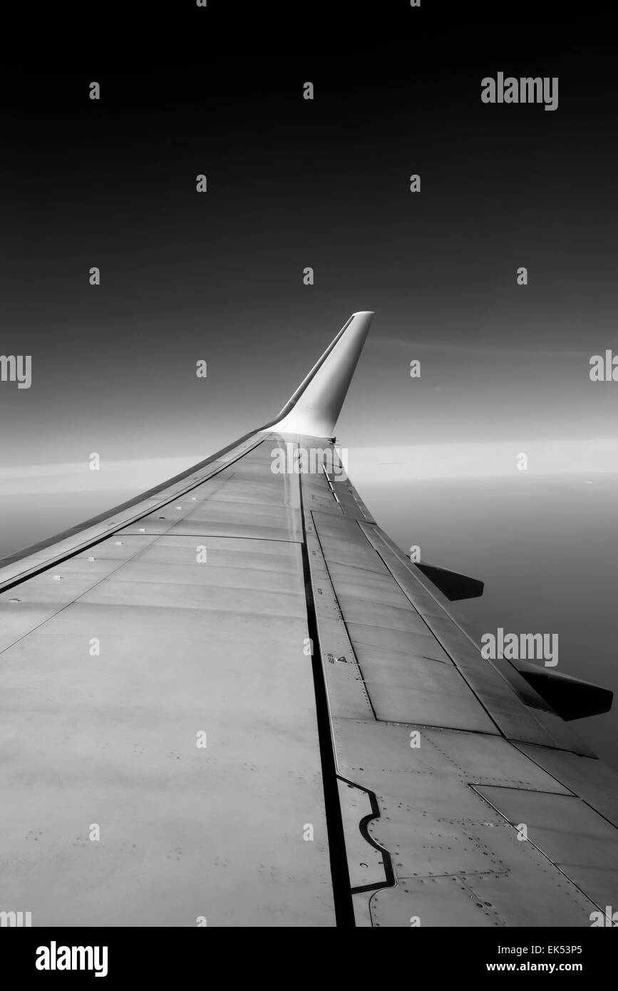 Italy, flying airplane wing Stock Photo Alamy