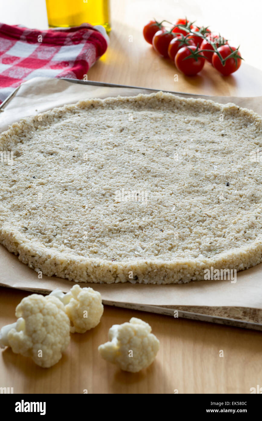 Pizza crust made from cauliflower rather than traditional bread dough Stock Photo