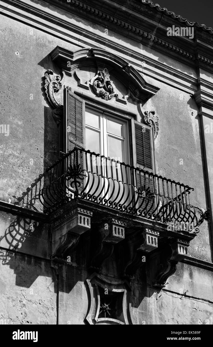 Italy, Sicily, Ragusa, baroque building facade, original balcony Stock Photo