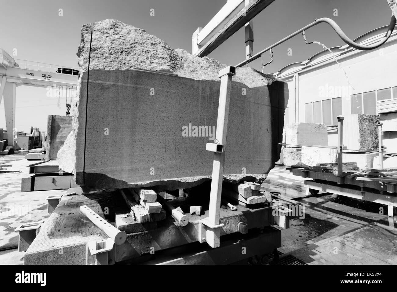 Italy, marble cutting factory, granite block industrial Stock Photo