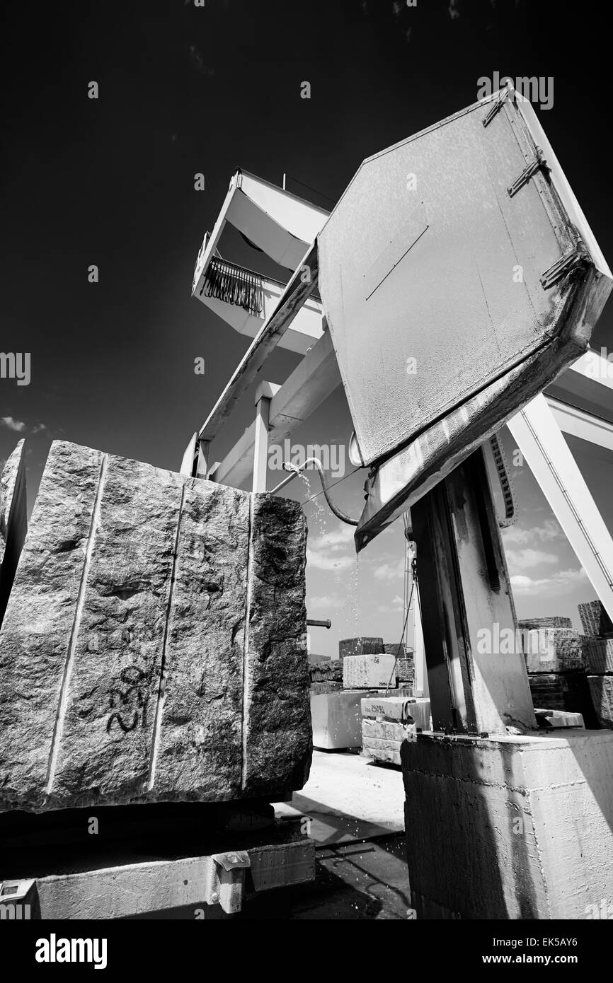 Italy, marble cutting factory, marble block cooled with water while