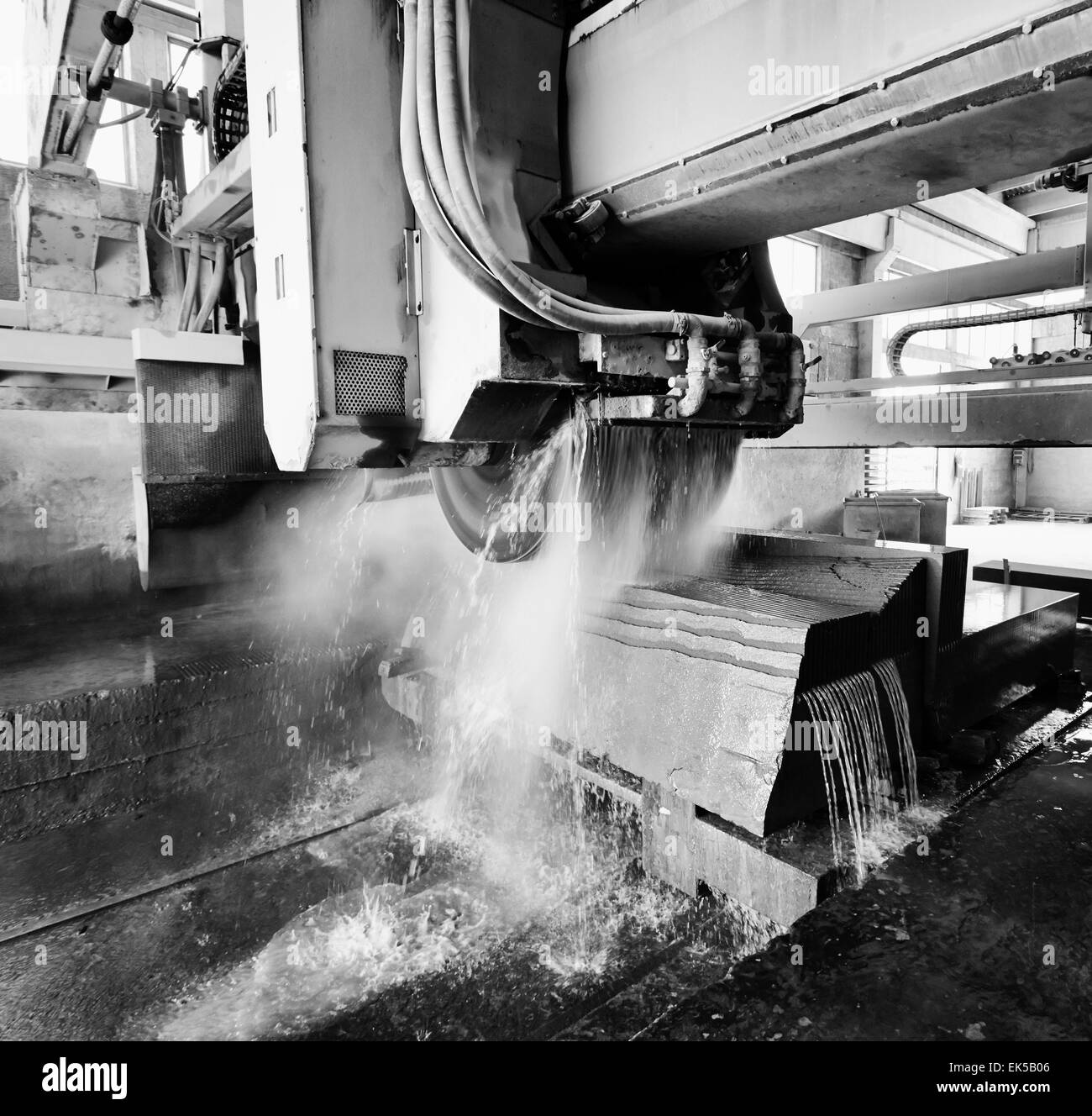 Italy, marble cutting factory, marble being cooled with water while cut