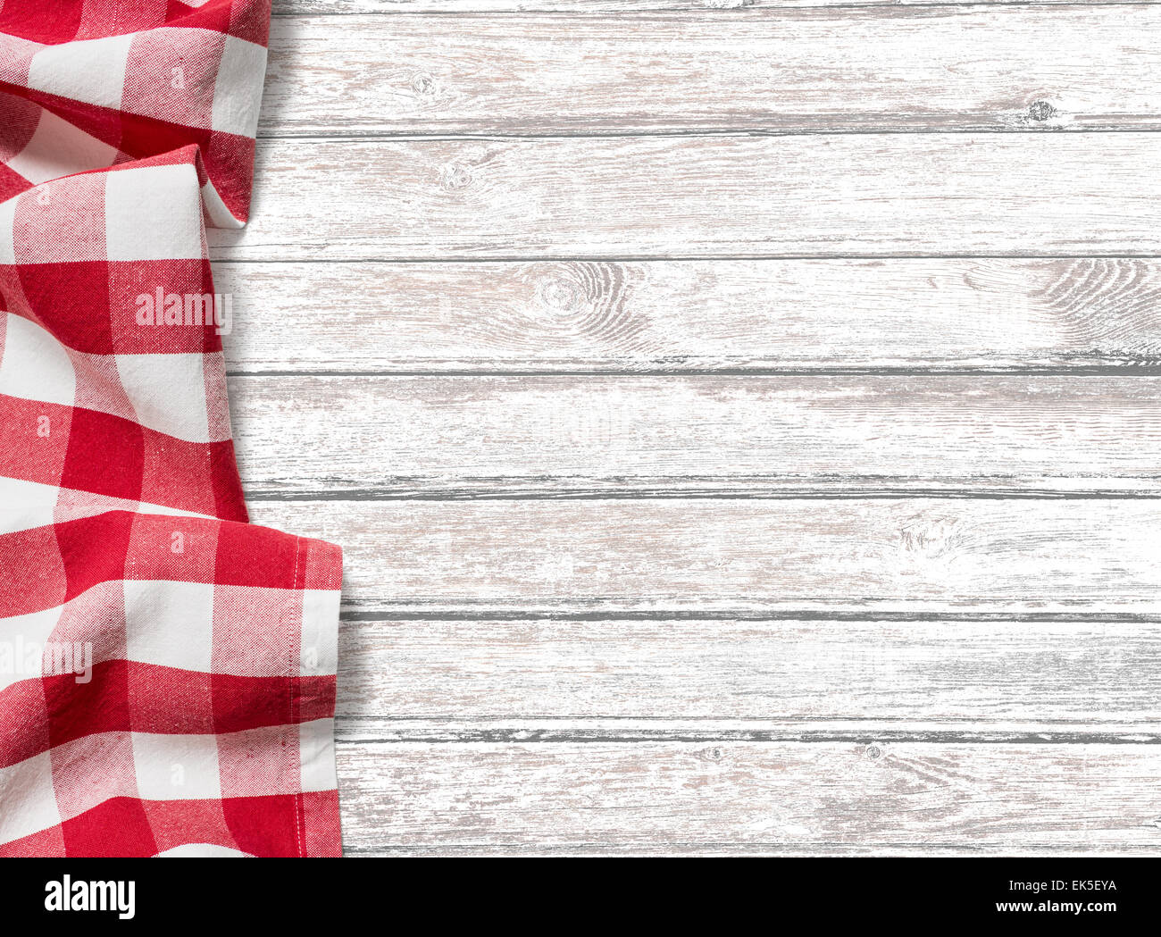 kitchen table background with red picnic cloth Stock Photo