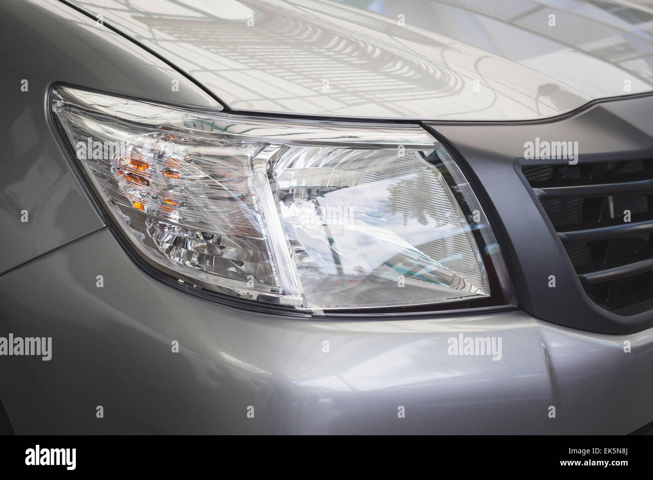 Back View Front Light Close up Front light and front view of new car Stock Photo - Alamy