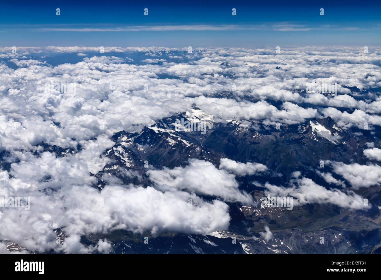 Italy, aerial view of the italian Alps and some clouds Stock Photo - Alamy