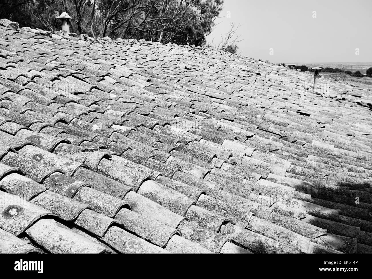 Italy, Sicily, countryside, old shingles on the roof of a stone house Stock Photo