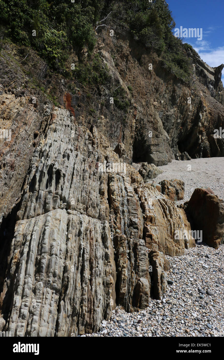 Limestone rock layers Monro beach New Zealand Stock Photo