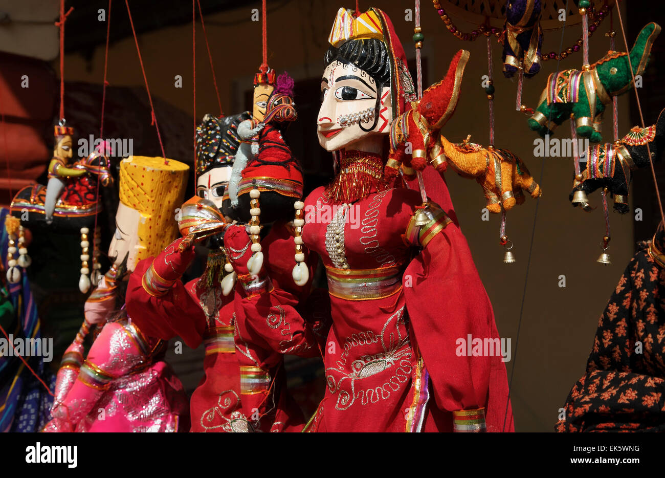 India, Rajasthan, Jaipur, indian wooden puppets for sale in a local