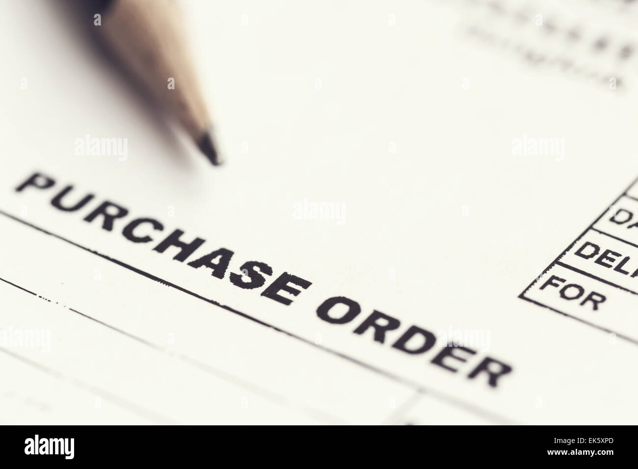 Macro Purchase order with pencil Stock Photo