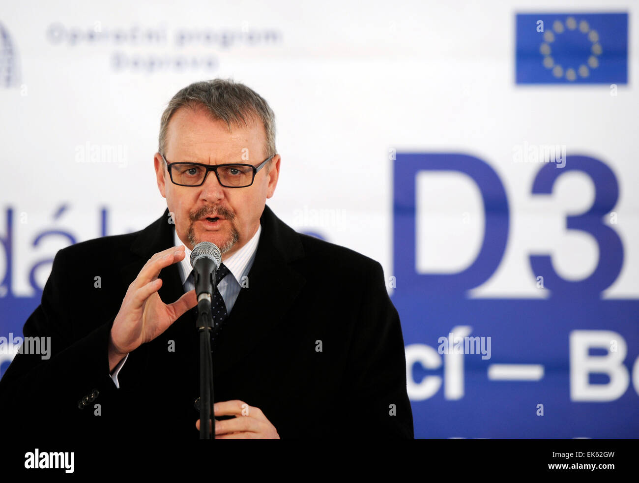 Czech Minister of Transport Dan Tok speaks to journalist during the symbolical ceremony of start the construction of further two sections of motorway D3 was held in Veseli nad Luznici, Czech Republic, April 4, 2015. Motorway will connect Prague with Ceske Budejovice in section Veseli nad Luznici to Bosilec and in Borek to Usilne. (CTK Photo/Vaclav Pancer) Stock Photo
