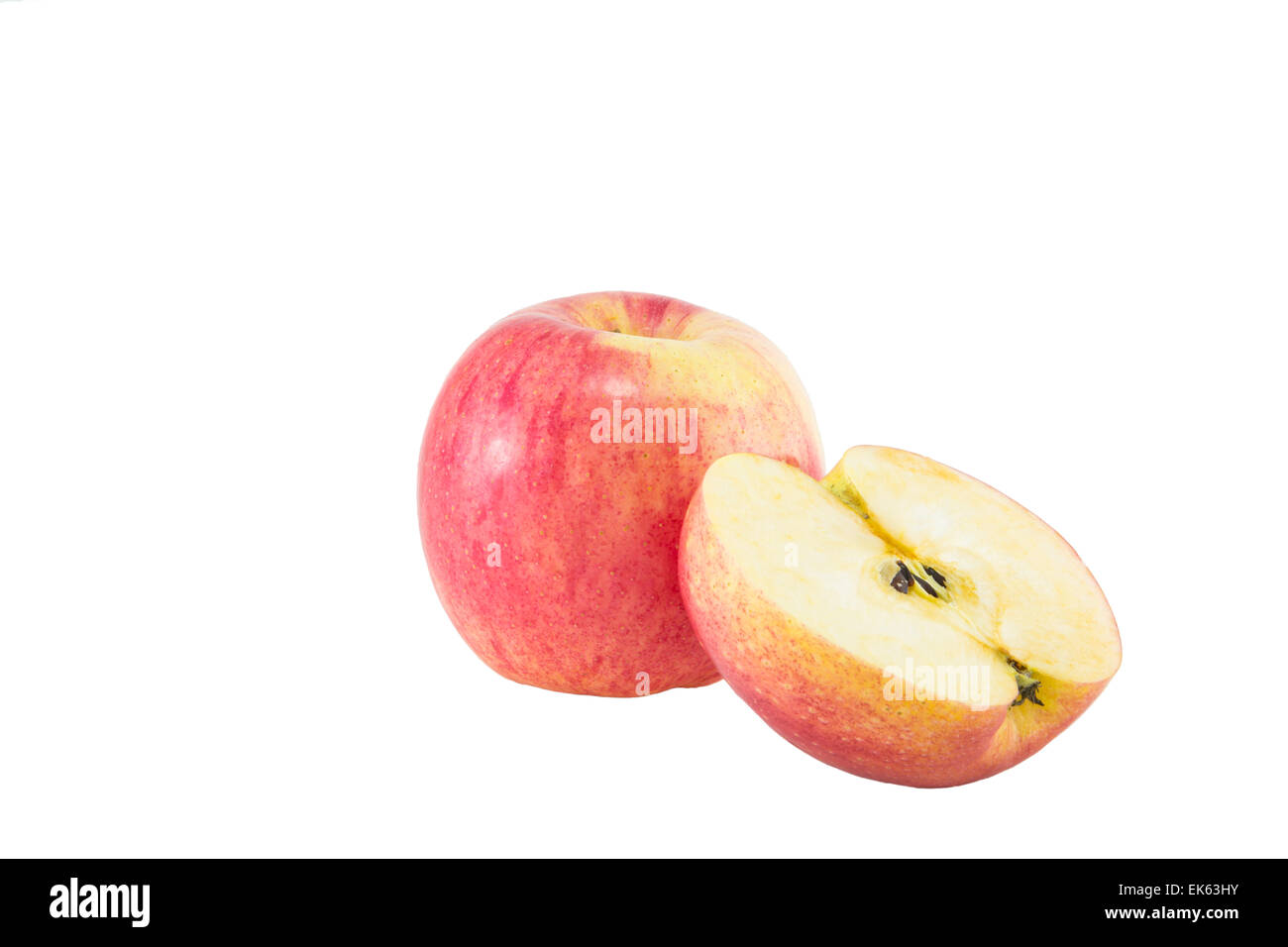 Apple is cutting out the area to eat. On a white background Stock Photo