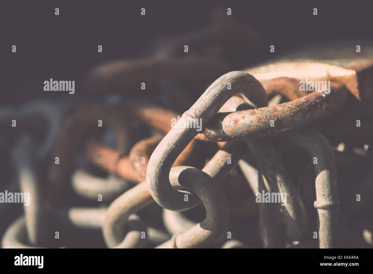 Rusty Chain Lock Macro old lock and rusty chain on black background Stock Photo - Alamy