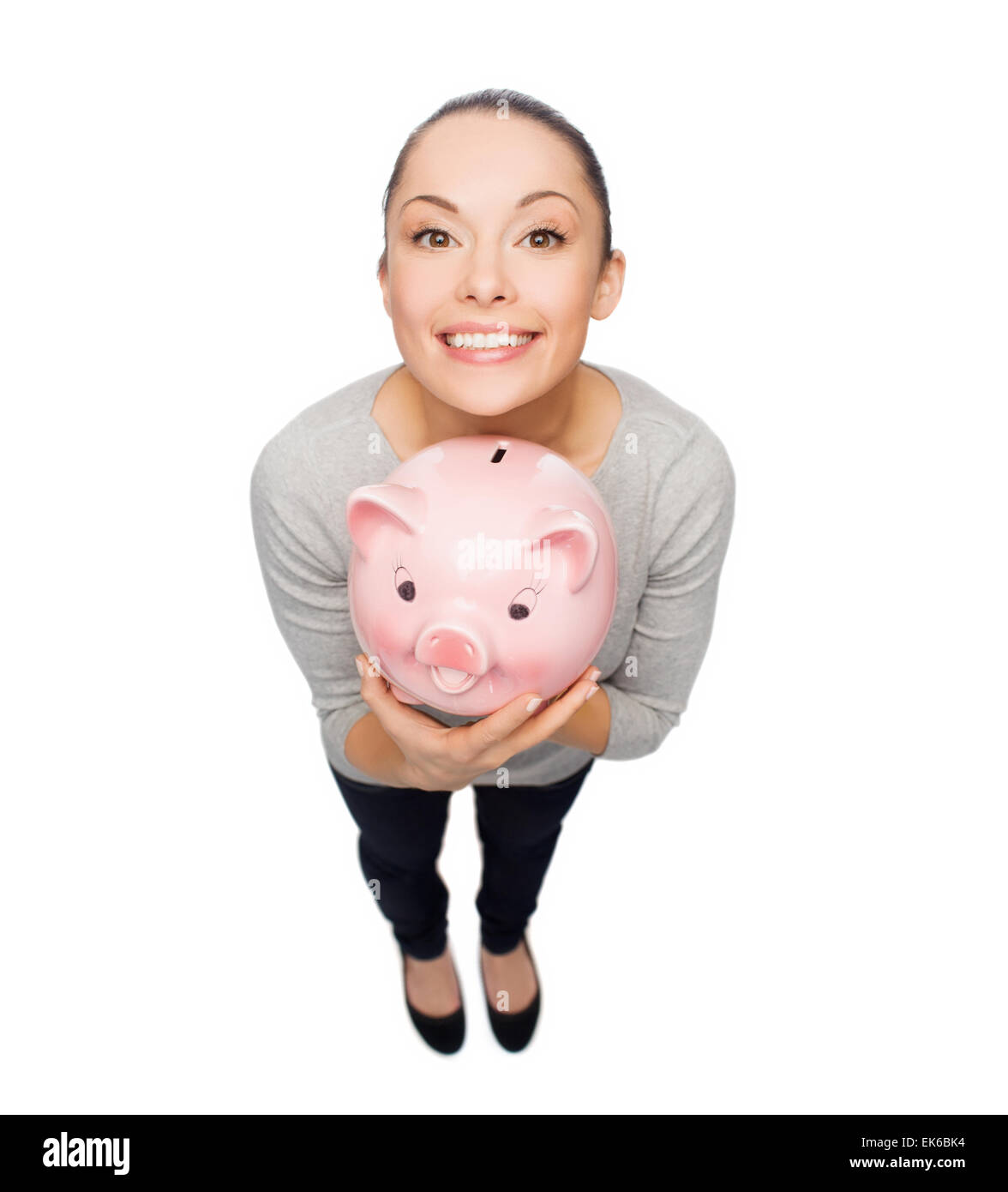 happy woman with piggy bank Stock Photo - Alamy