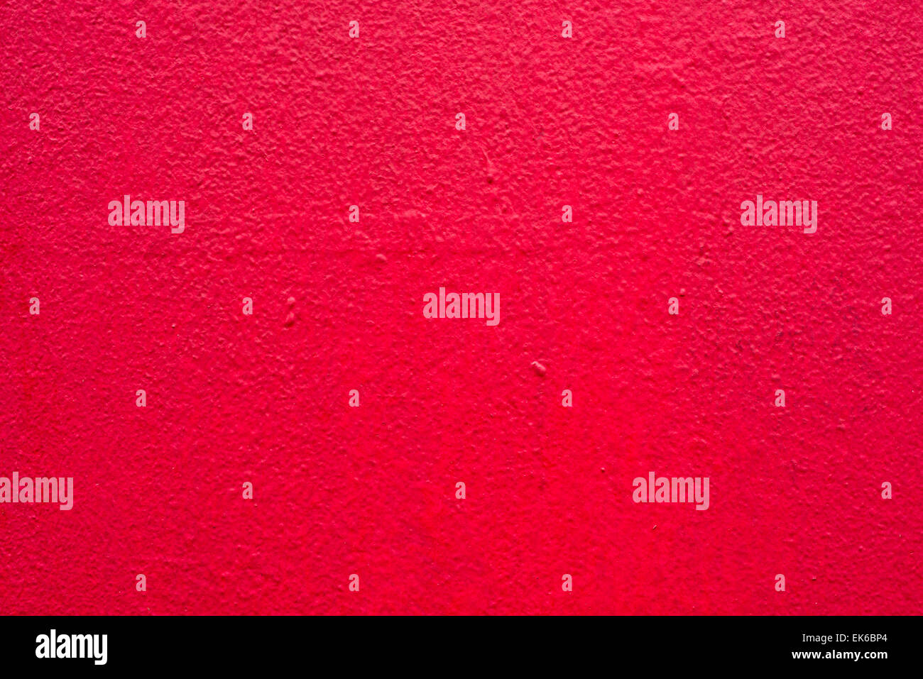 detailed paint pattern of red wall exterior Stock Photo
