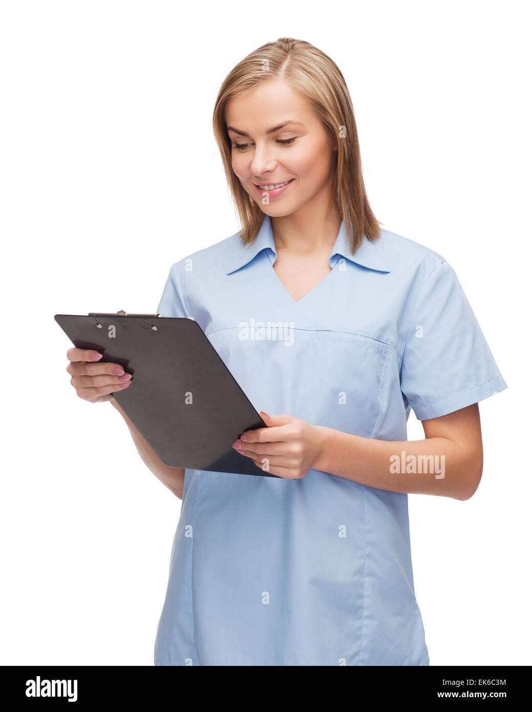 smiling female doctor or nurse with clipboard Stock Photo - Alamy