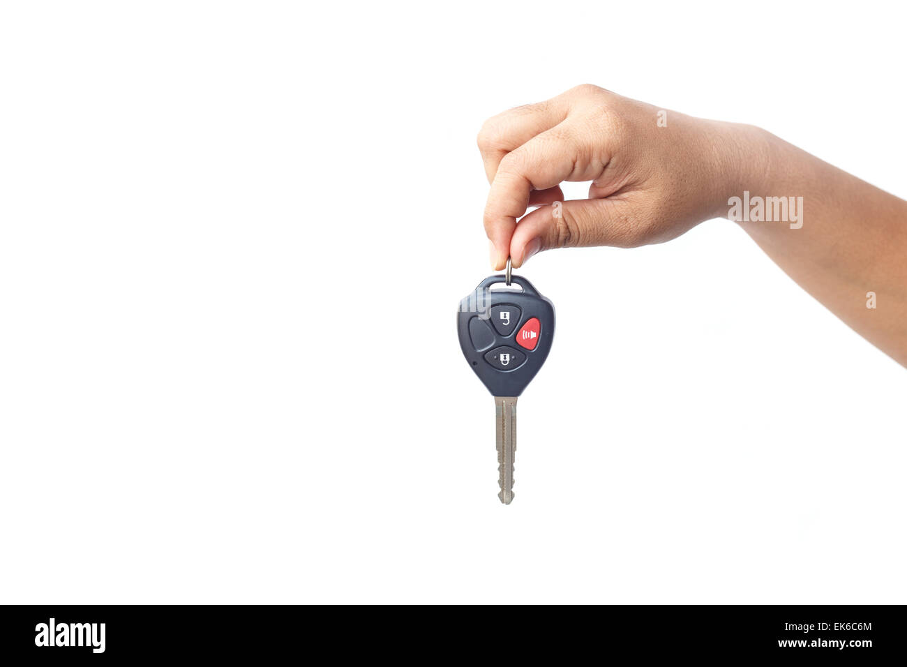 Hand holding car key isolated on white background Stock Photo Alamy