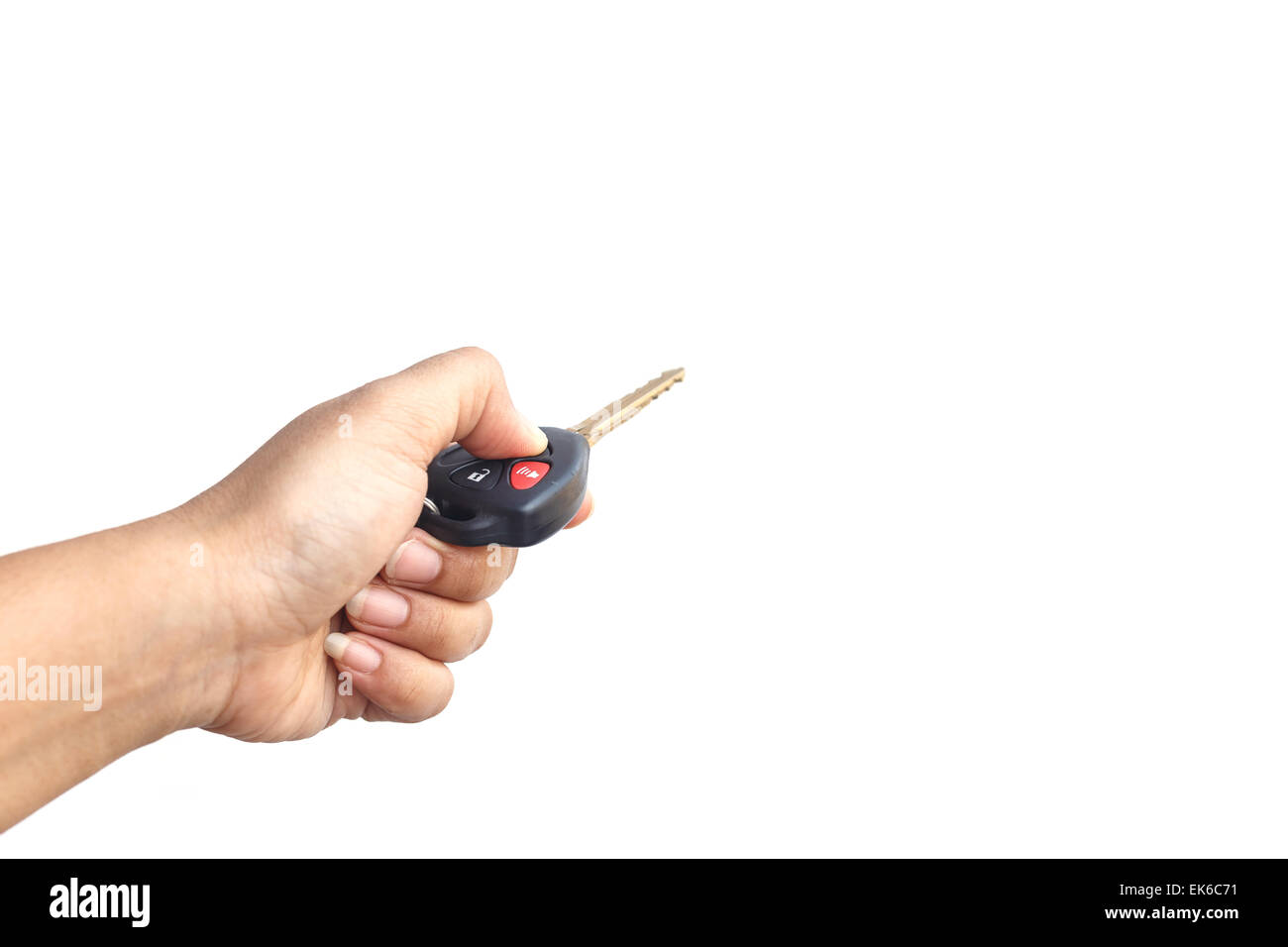 Hand holding car key isolated on white background Stock Photo - Alamy