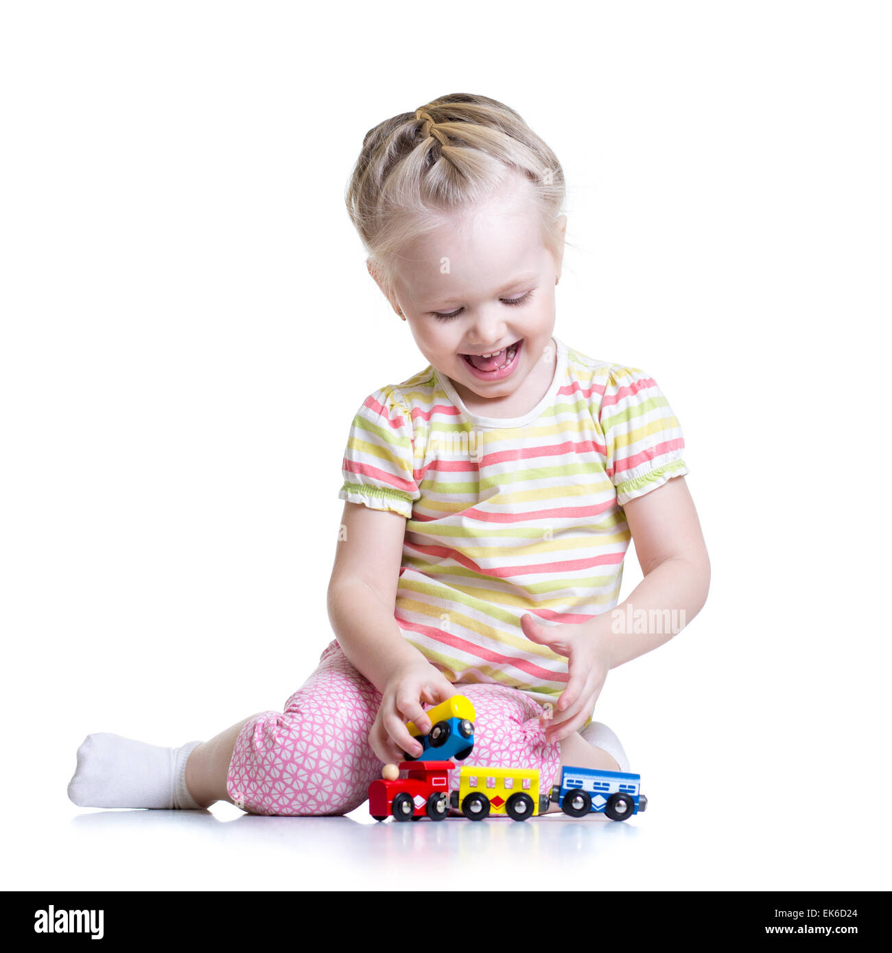 child girl playing with color toys Stock Photo