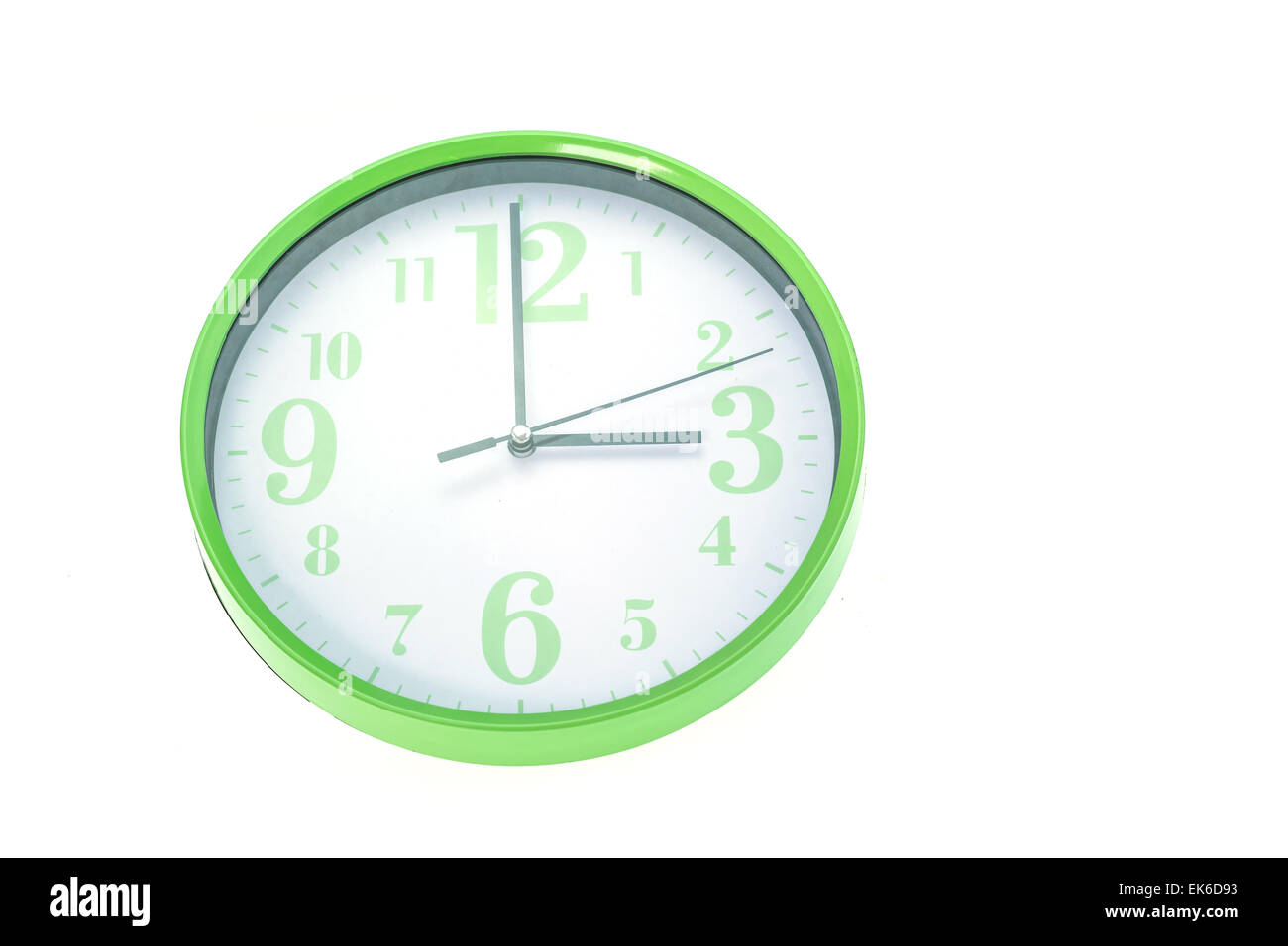 Green wall clock isolated on white background Stock Photo - Alamy