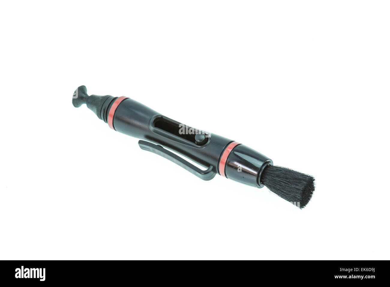 Lens pen and brush for cleaning camera isolated on white background