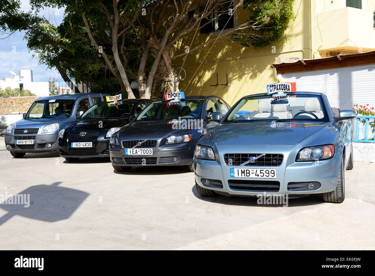 The cars for rent are waiting for clients near rent office, Crete, Greece Stock Photo