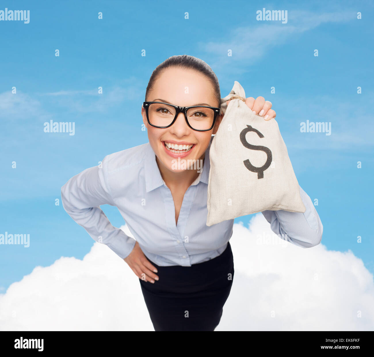 happy businesswoman holding money bag with dollar Stock Photo Alamy