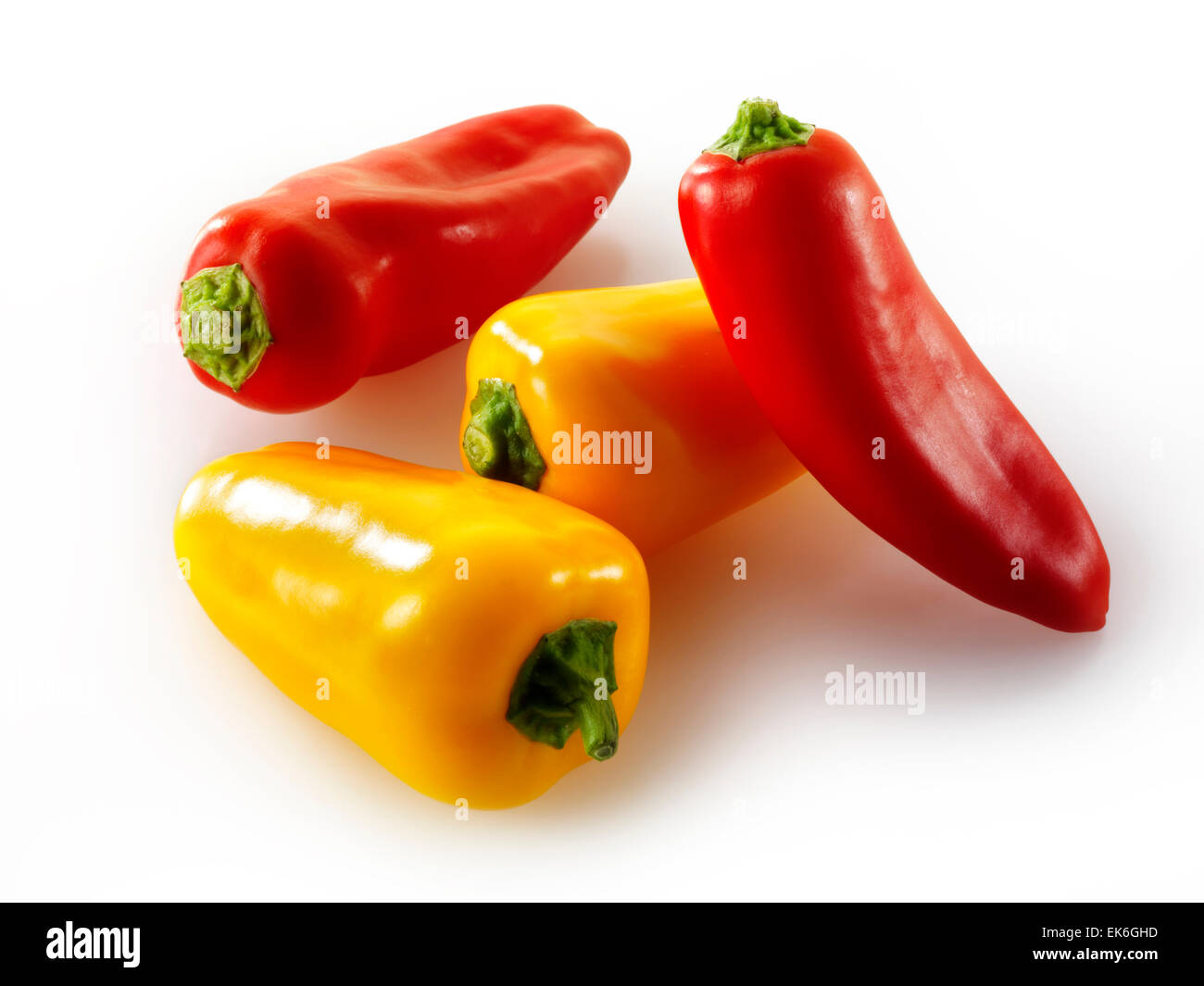Mixed whole fresh red, orange & yellow baby sweet bell peppers Stock Photo Alamy