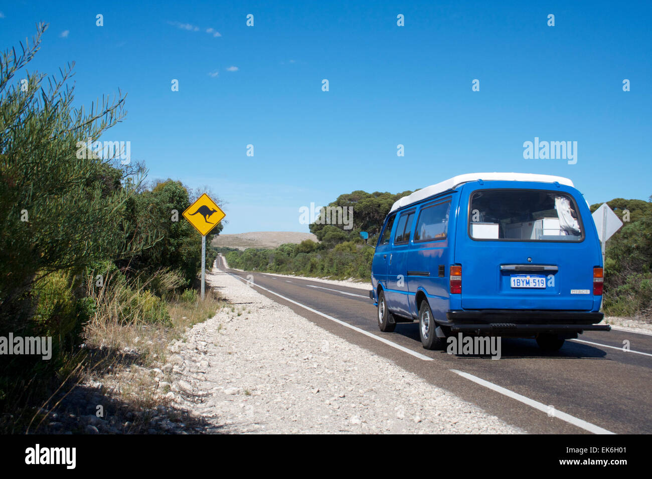 Camper van driving towards a Kangaroo sign. Australia Stock Photo - Alamy
