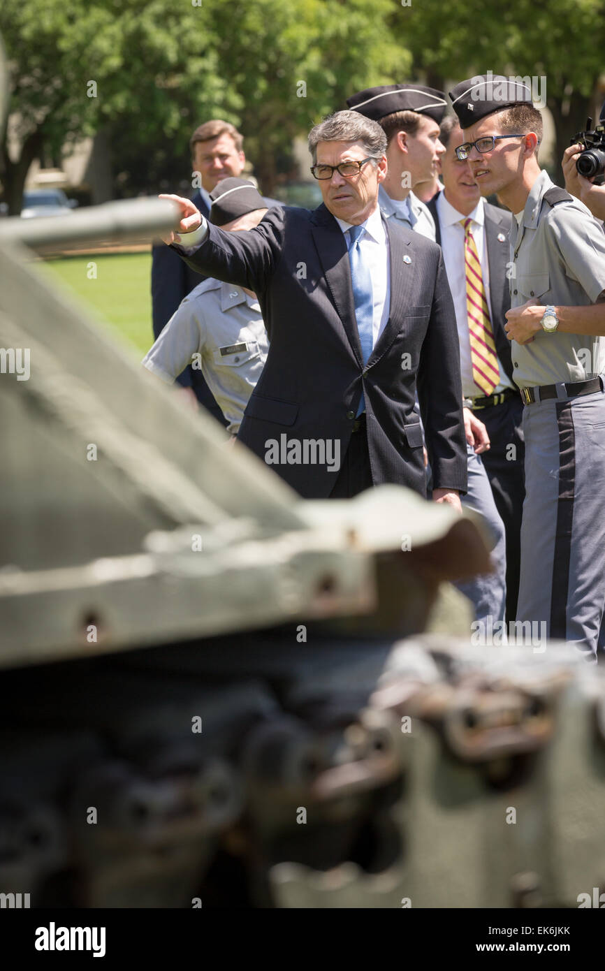 Former Texas Governor and potential Republican presidential candidate Rick Perry tours the campus and monuments of the Citadel military college April 6, 2015 in Charleston, South Carolina. Stock Photo