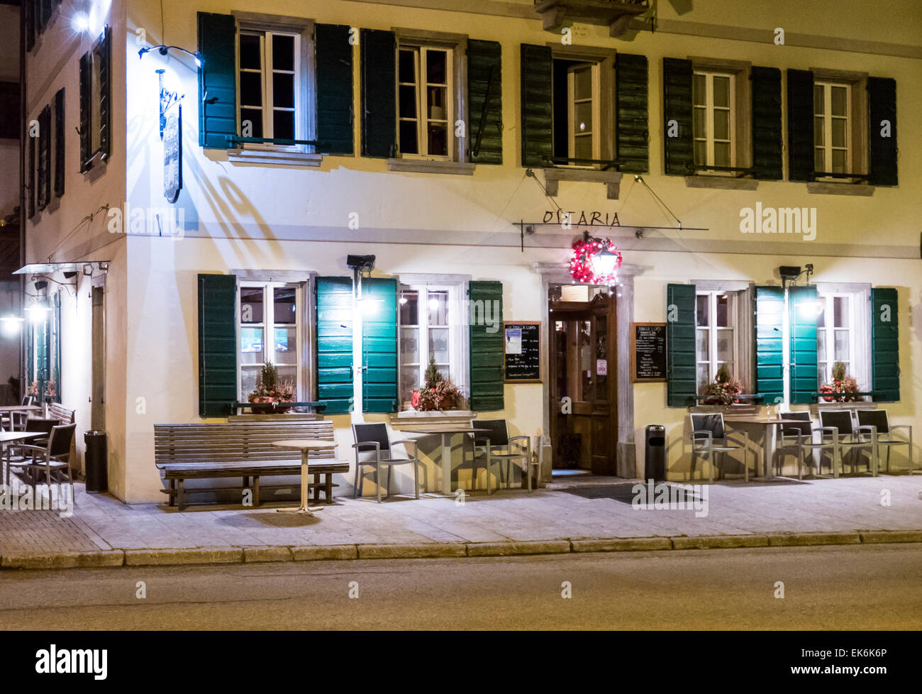 Exterior night view of restaurant in northern Italy Stock Photo