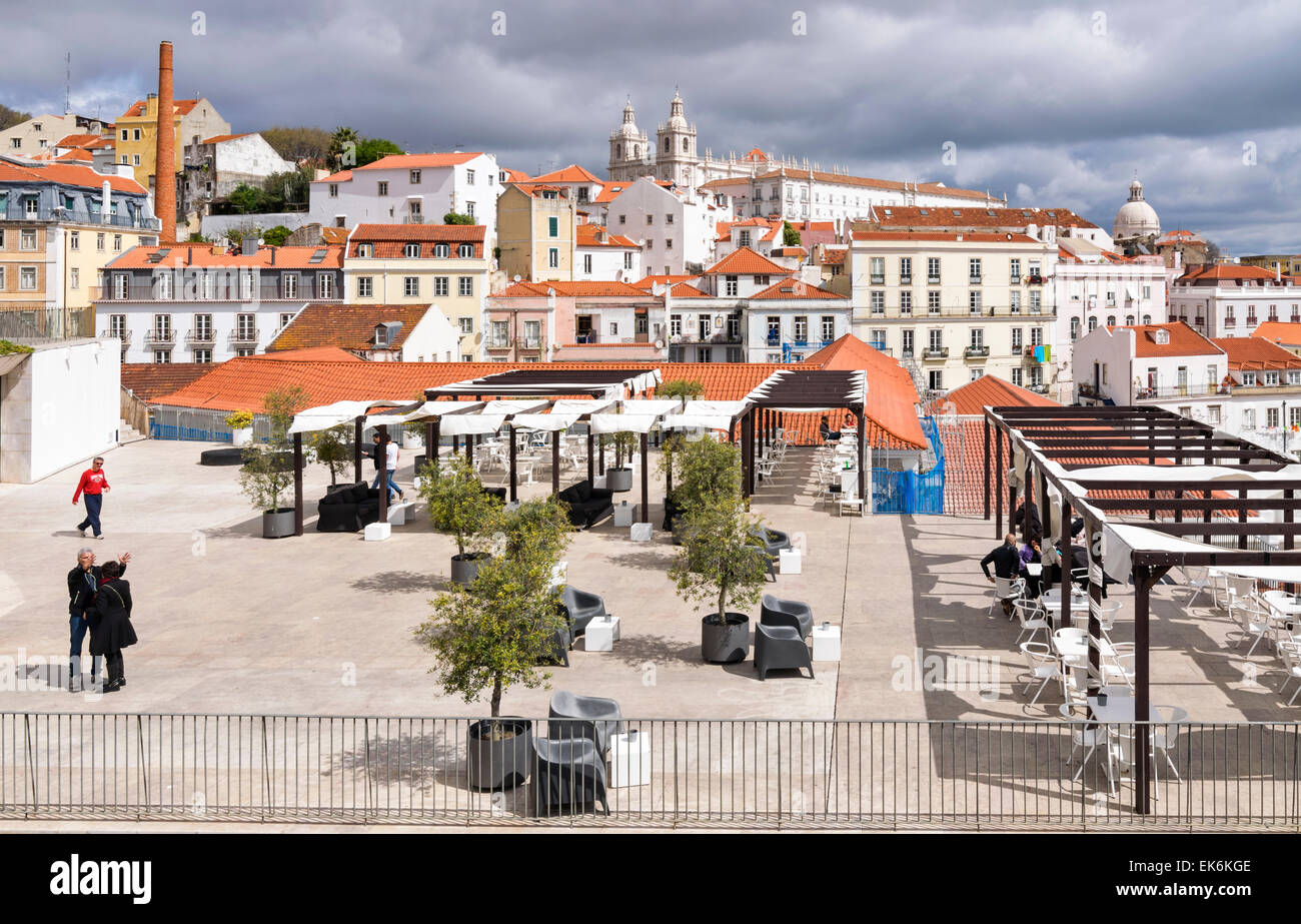 LISBON PORTUGAL CAFE WITH A VIEW AND CATHEDRAL IN THE BACKGROUND Stock Photo