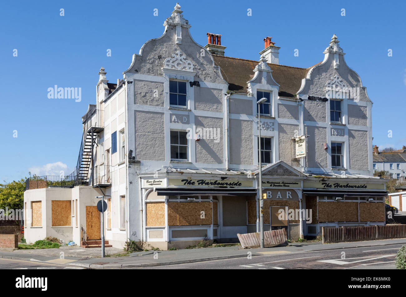 Closed and boarded up restaurant in Newhaven East Sussex England United Kingdom UK Stock Photo