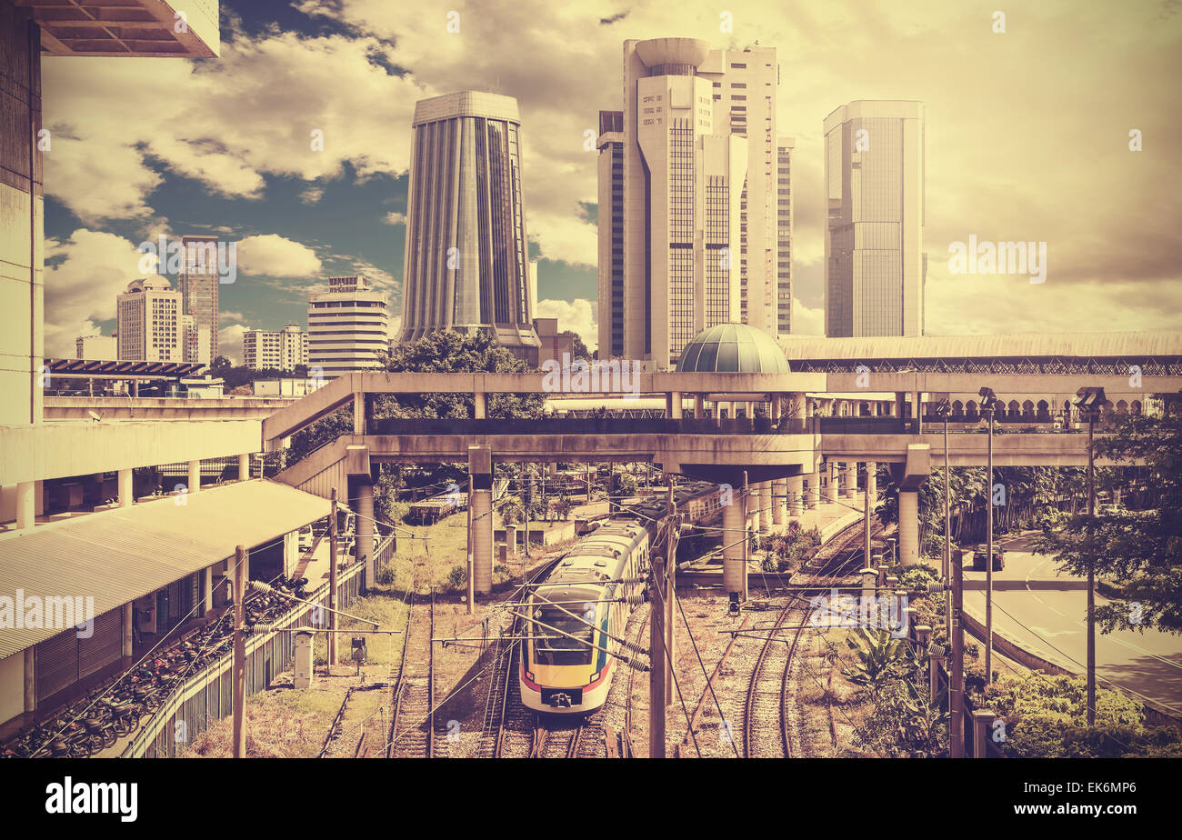 Retro stylized photo of a modern city, Kuala Lumpur, Malaysia. Stock Photo