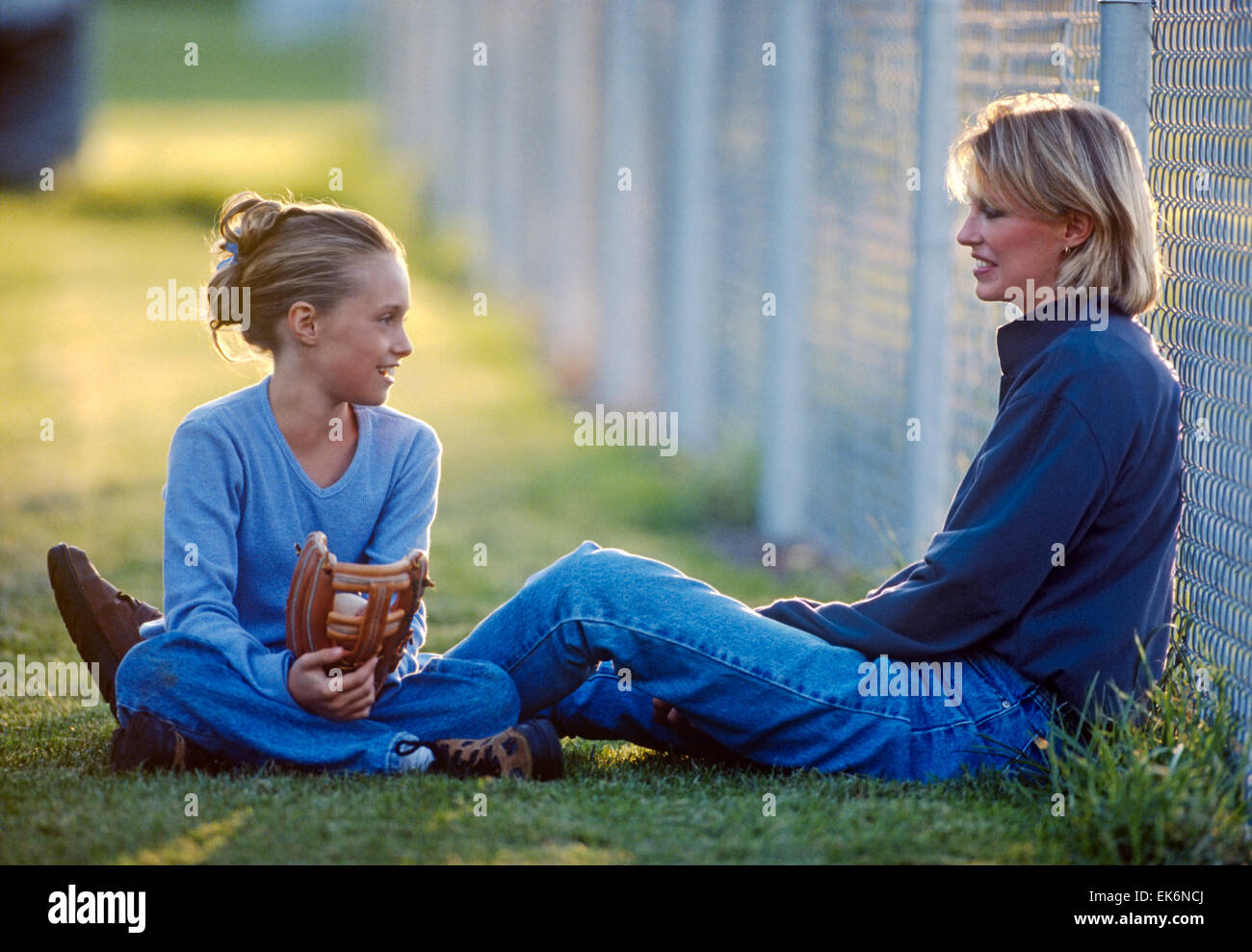 mother talking to daughter Stock Photo