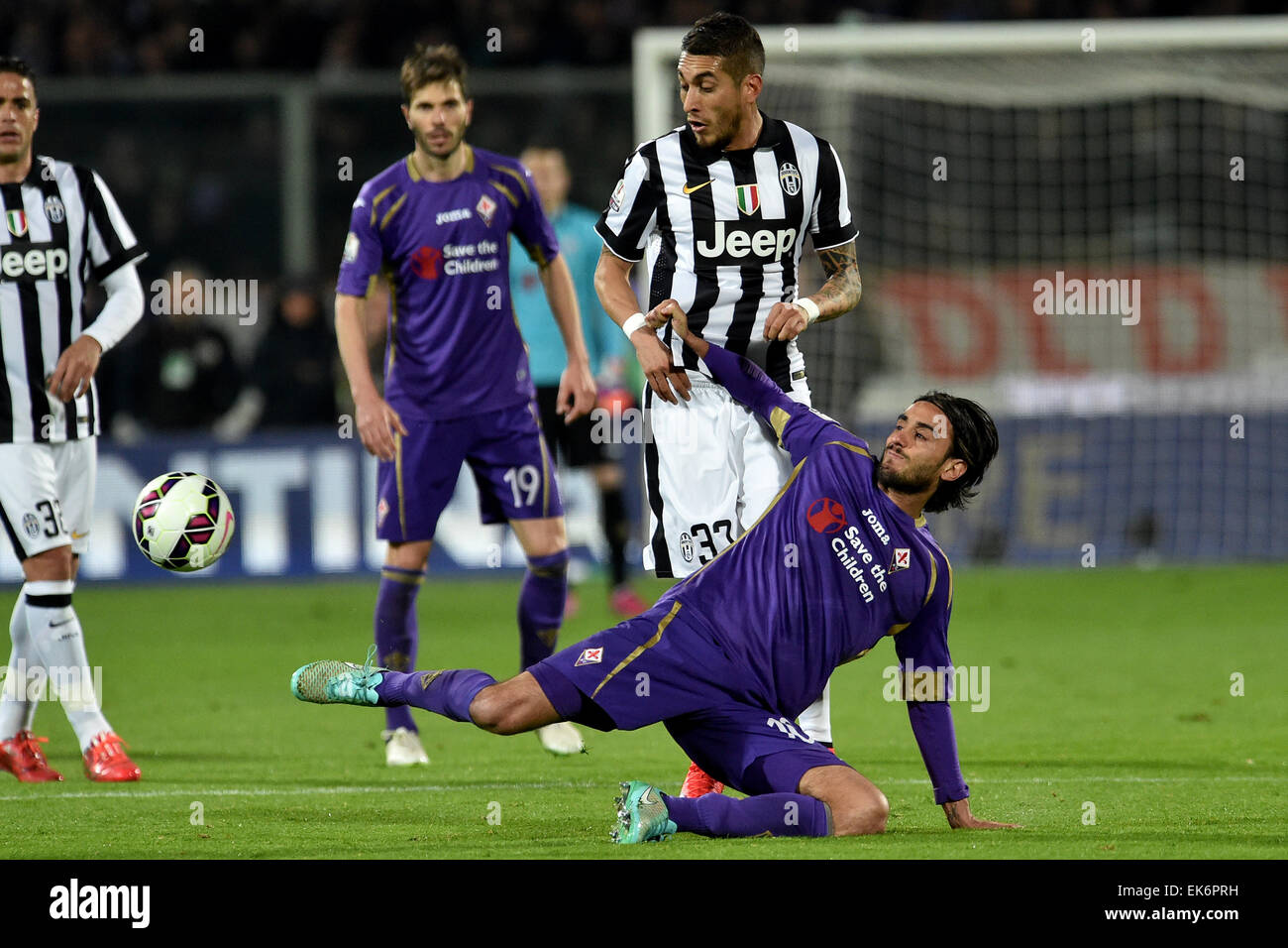 Florence, Italy. 07th Mar, 2015. Coppa Itallia Football. Fiorentina versus Juventus. Alberto Aquilani (Fio) is challenged by Roberto Pereyra (Juv) Credit:  Action Plus Sports/Alamy Live News Stock Photo