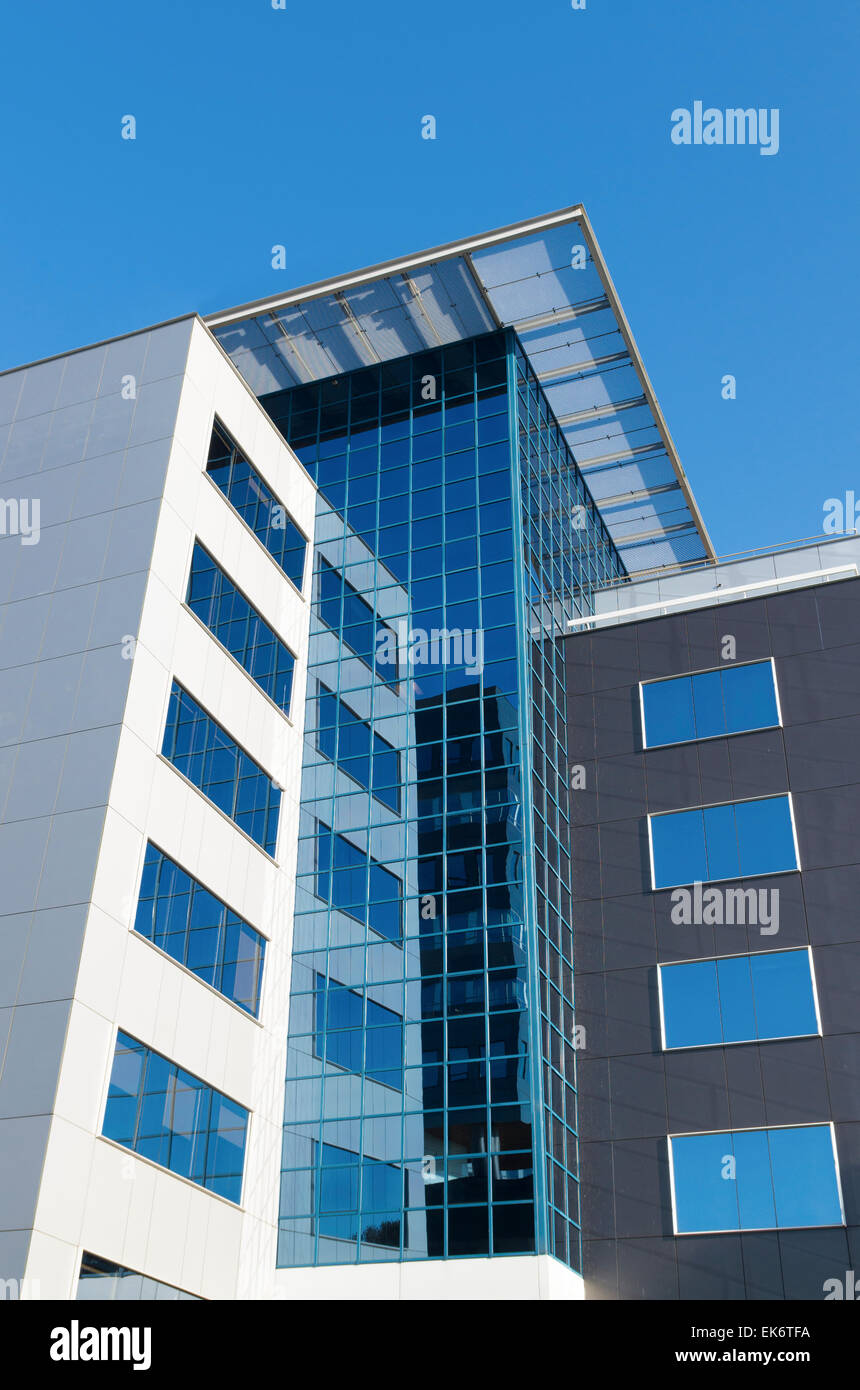 exterior of a modern office building with glass facade Stock Photo