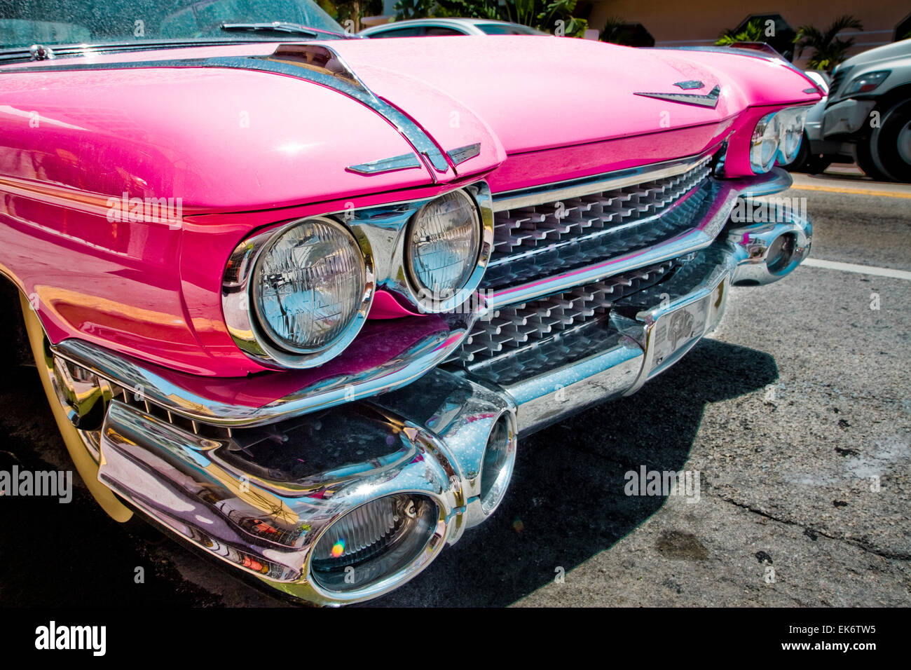 Front grille of a 1959 pink Cadillac El Dorado outside the Marlin Hotel on Collins Avenue, Miami Beach, Florida, USA. Stock Photo