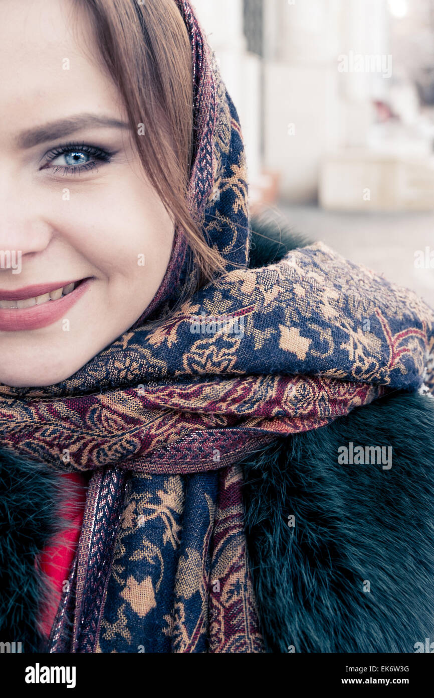 Half face of a russian Women in winter shawl, toned image Stock Photo