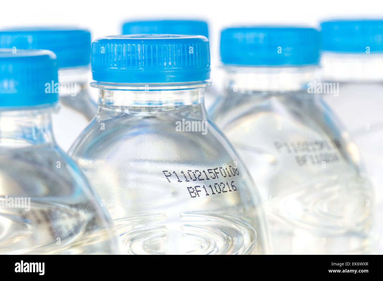 Drinking water bottle with expiration date isolated on white background