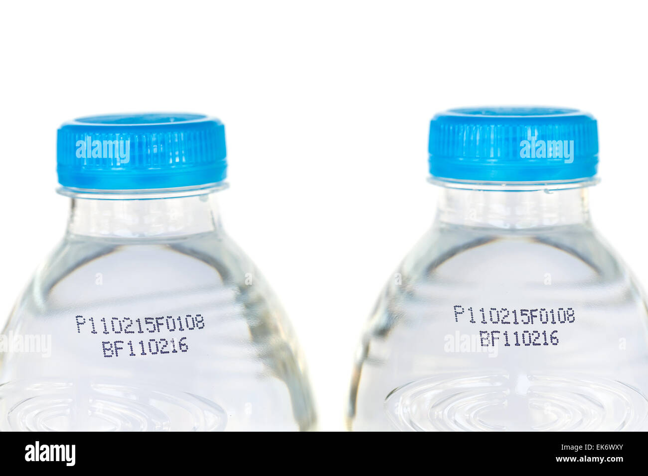 Drinking water bottle with expiration date isolated on white background