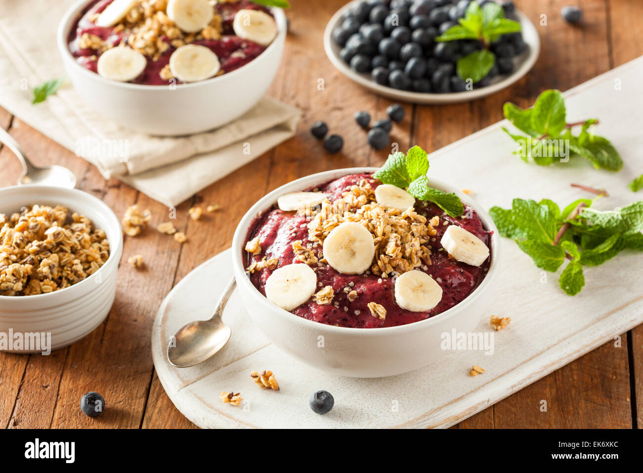 Healthy Organic Berry Smoothie Bowl with Granola and Fruit Stock Photo