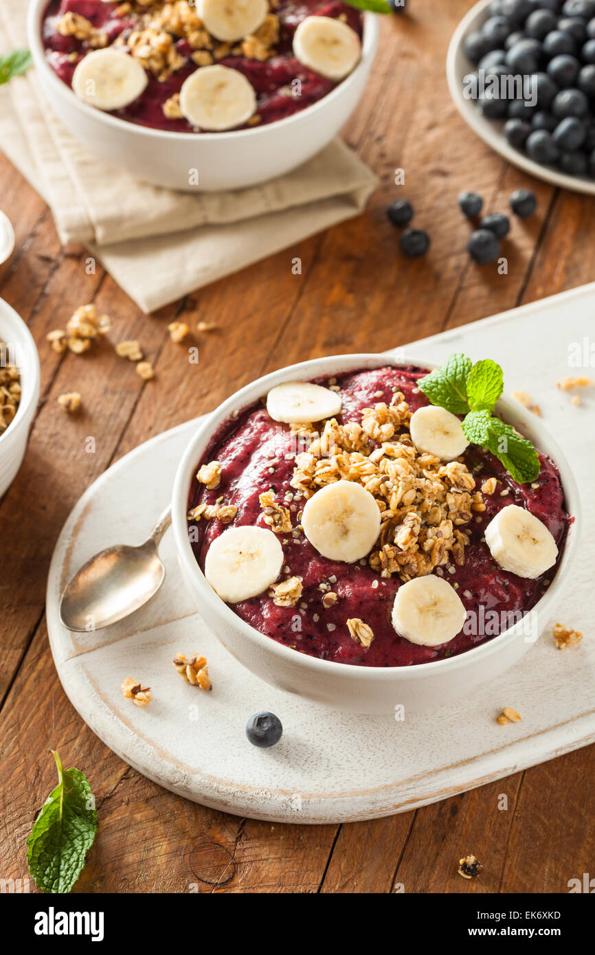 Healthy Organic Berry Smoothie Bowl with Granola and Fruit Stock Photo