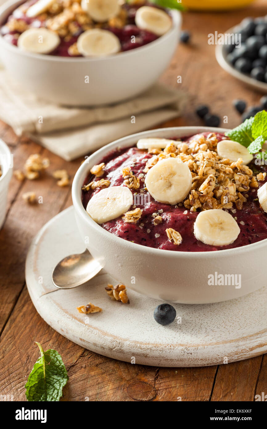 Healthy Organic Berry Smoothie Bowl with Granola and Fruit Stock Photo