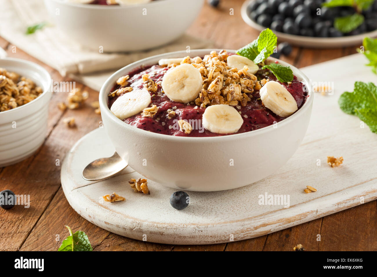 Healthy Organic Berry Smoothie Bowl with Granola and Fruit Stock Photo