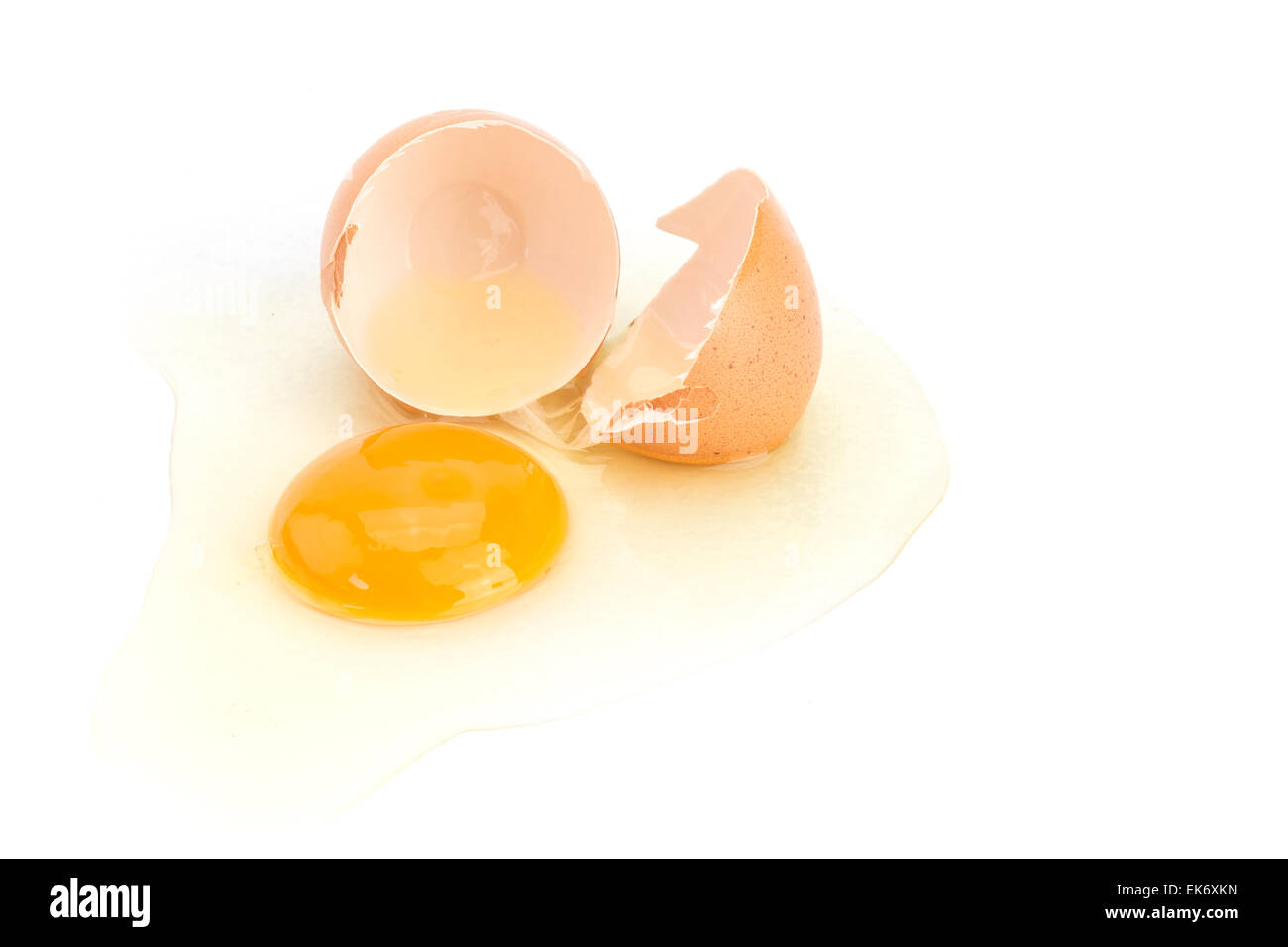 Broken egg isolated on white background Stock Photo - Alamy