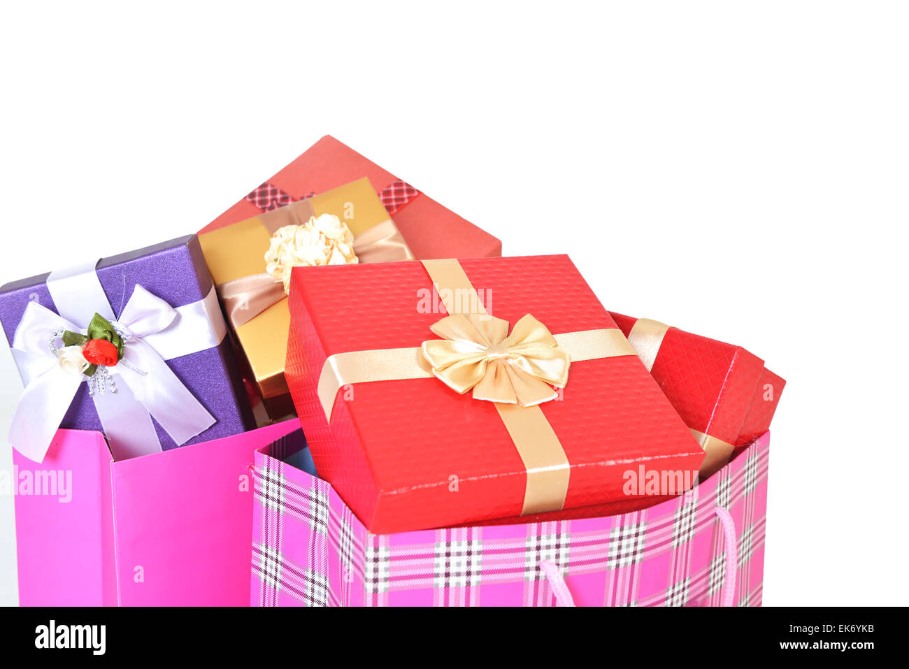 Pile Christmas Gifts Colorful Red Bows Wrapped Brown Paper Gift Stock Photo  by ©PantherMediaSeller 338369070