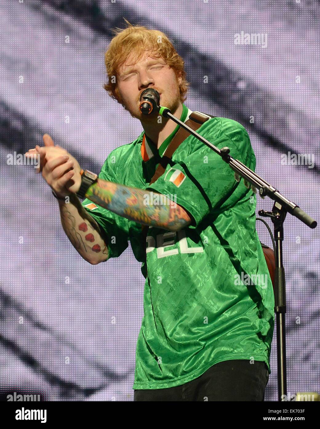 Ed Sheeran performs at 3Arena in Dublin wearing an Irish football