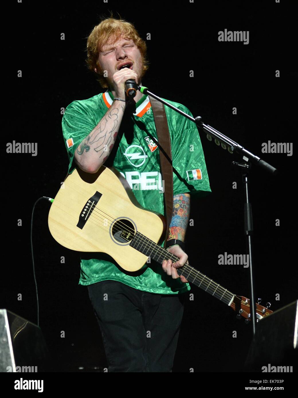 Ed Sheeran performs at 3Arena in Dublin wearing an Irish football